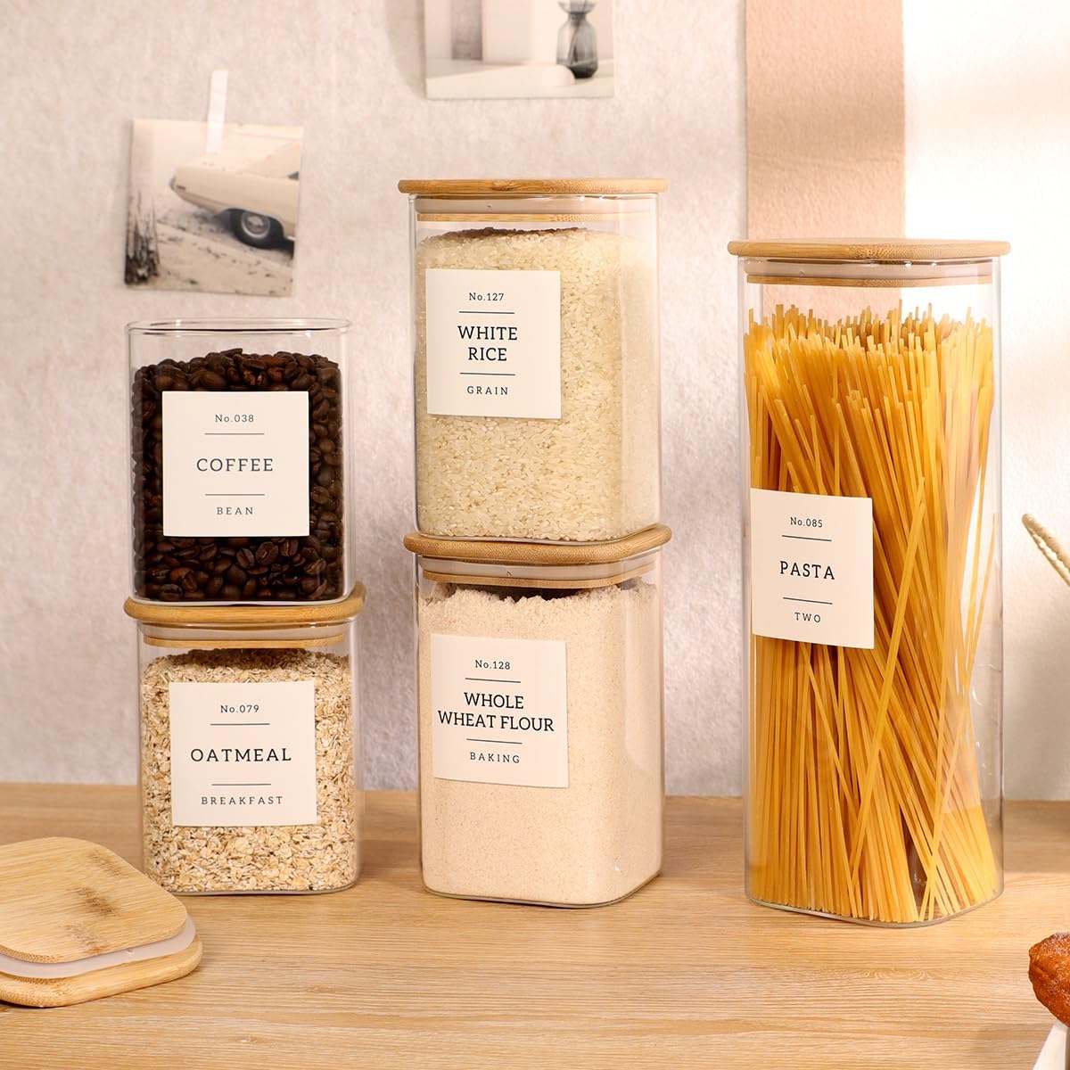 5 Pack Square Glass Pantry Storage Containers with 132 Kitchen Food Pantry Labels - Clear Glass Pantry Jars with Airtight Wood Bamboo Lids - Glass Canisters for Pasta, Cereal, Coffee, Flour, Sugar