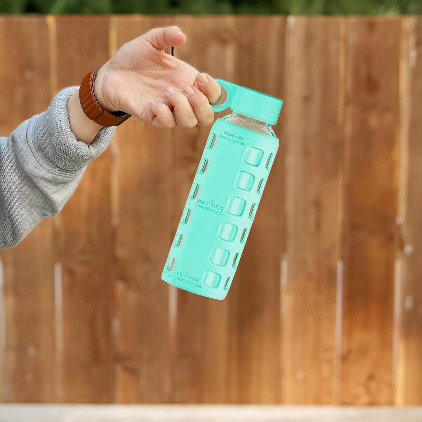 purifyou 40oz / 32oz / 22oz / 12oz Borosilicate Glass Water Bottle with Time & Volume Markers, Silicone Sleeve, Stainless Steel Lid – Reusable Glass Bottle for Water & Juice (12oz Glow-in-the-Dark)